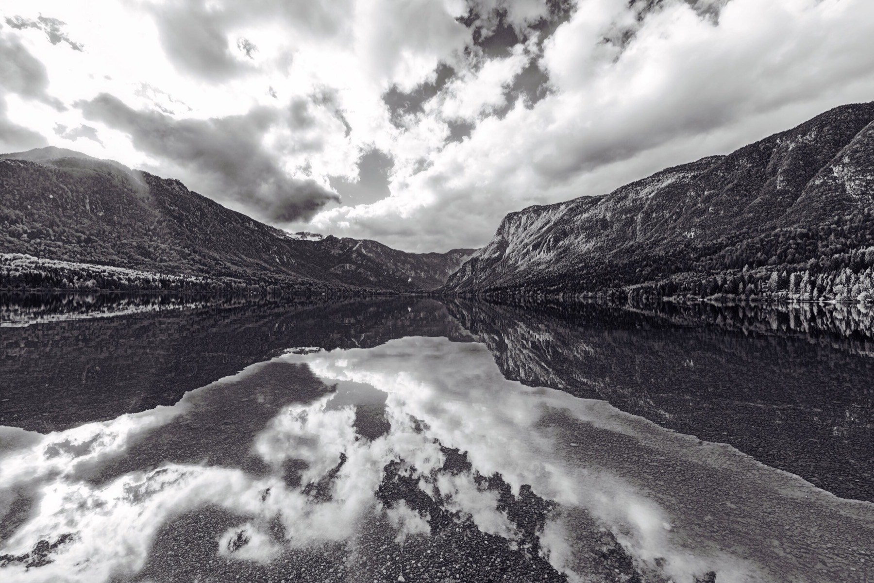 Black-and-white HDR landscape of a lake and mountains created with Relight